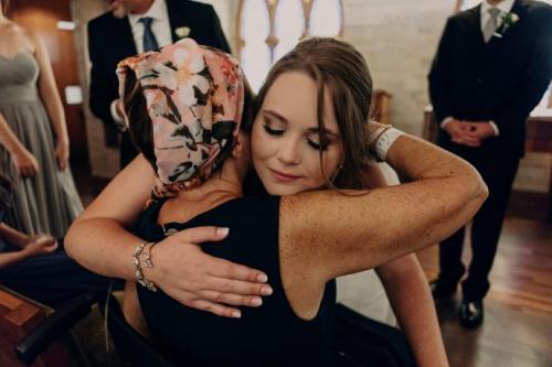 Maddie hugs Kim