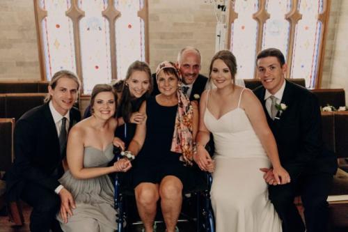 Maddie Cox's family during the wedding at St. Luke's chapel