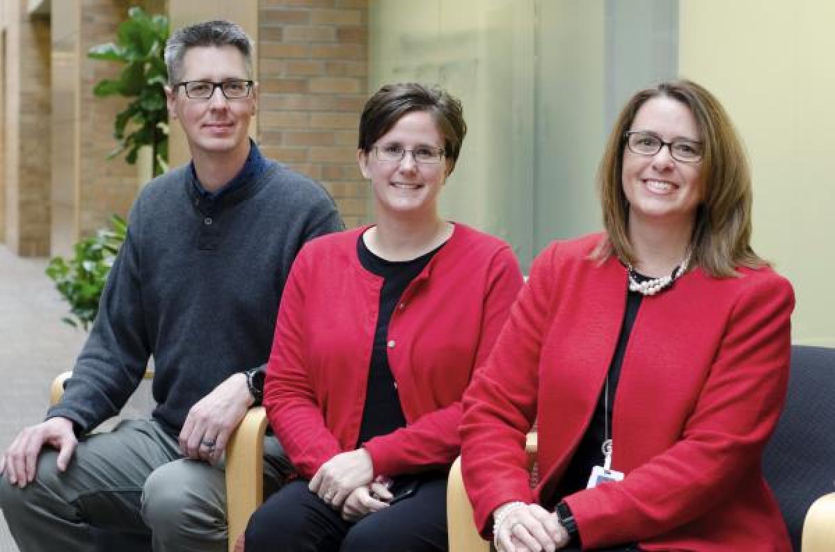 (From left to right) Chris Bultsma, Jocelyn Pearson and Cindy Sutton are credited for their quick action when a Mutual of Omaha employee collapsed walking into work.