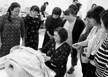 Nurses demonstrate a pelvic exam in Japan