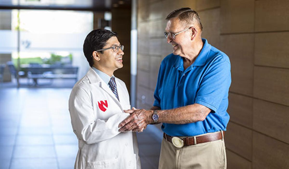 Vijaya Bhatt, MBBS, hematologist and medical oncologist, and Steve Waller, cancer survivor, visit following a check-up more than two years after Waller received a clean bill health.