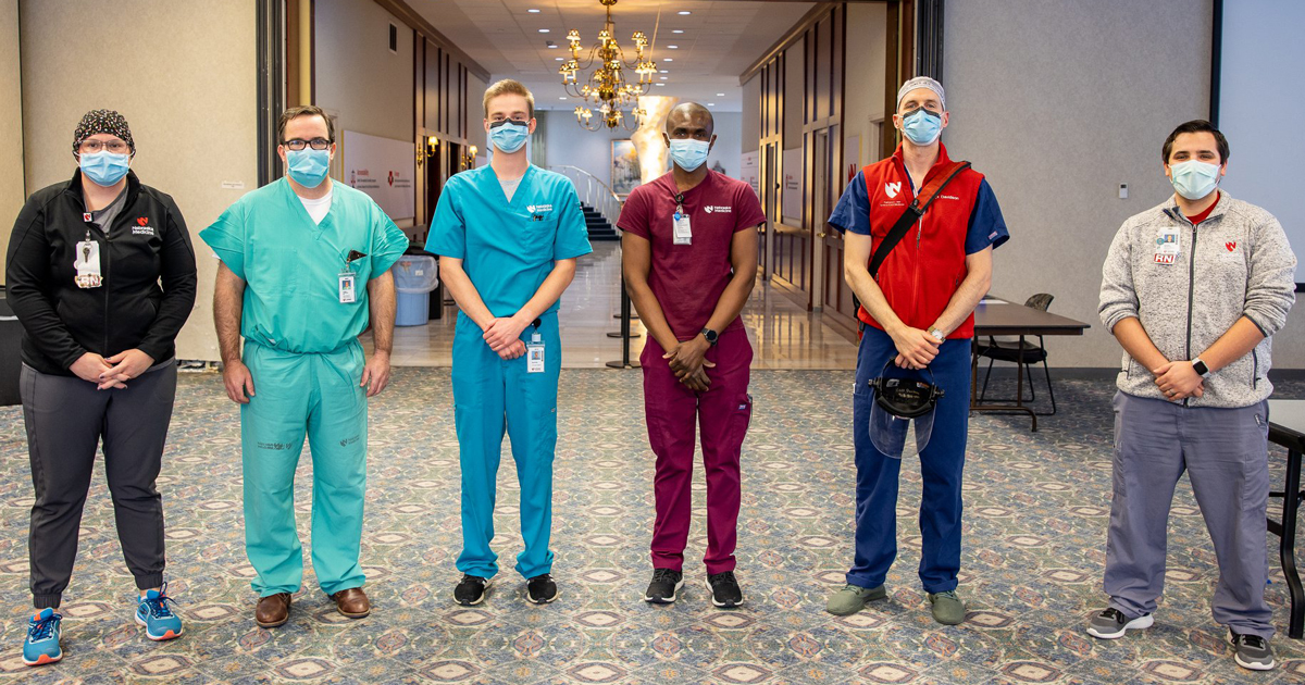 Here are the first six Nebraska Medicine health care workers to get the COVID-19 vaccine: Brandi Johansen, COVID-19 unit nurse manager; Dan W. Johnson, MD, critical care anesthesiologist; Martin Gilgenast, phlebotomist; Komi Gbedjeha, respiratory therapist; Ross Davidson, MD, UNMC chief pulmonary critical care fellow; and Kalen Knight, ER nurse.