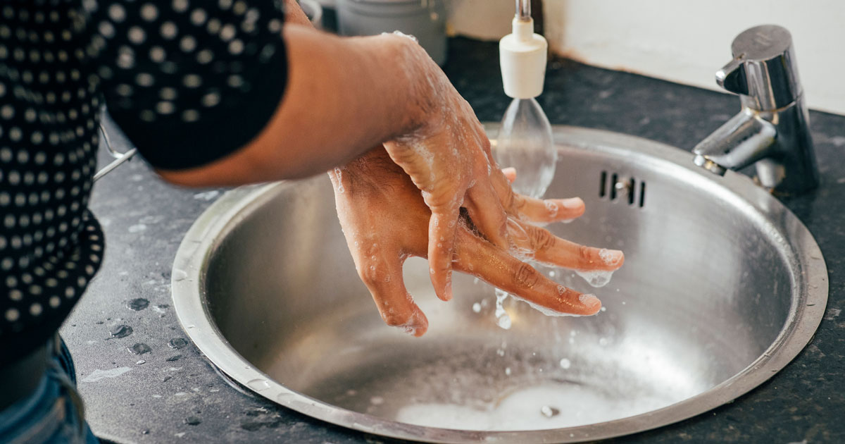 Close up of woman washing her hands