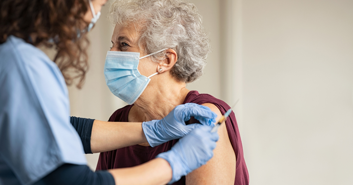 Older woman getting vaccine