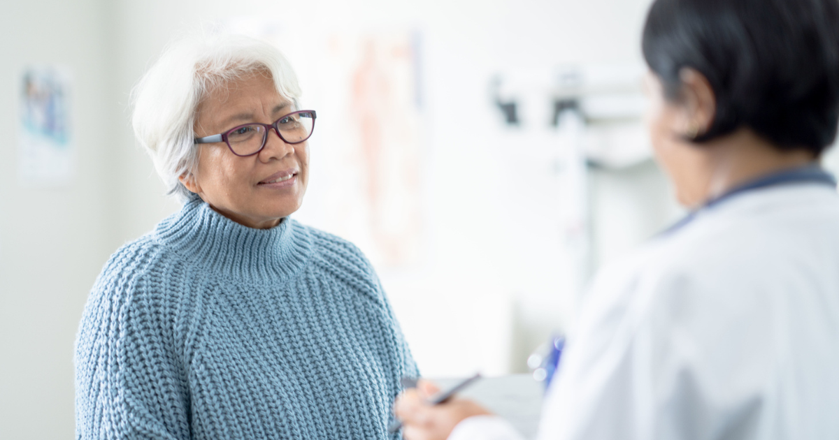 Older woman talking to her doctor