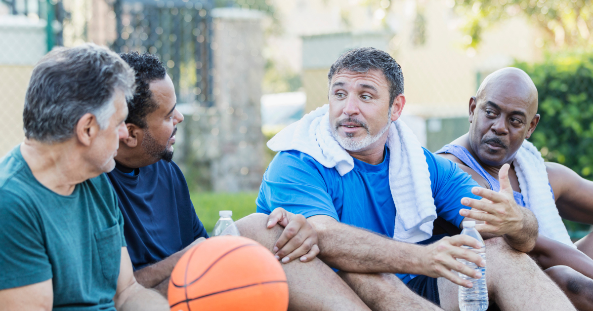 Group of men playing basketball