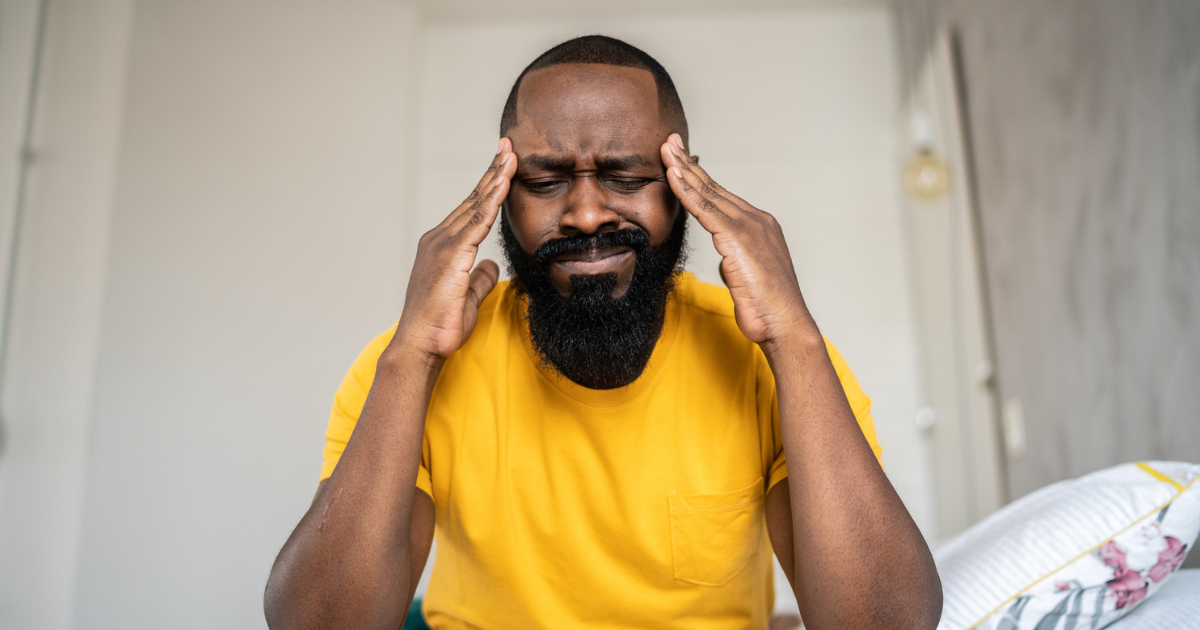 Man holding his head