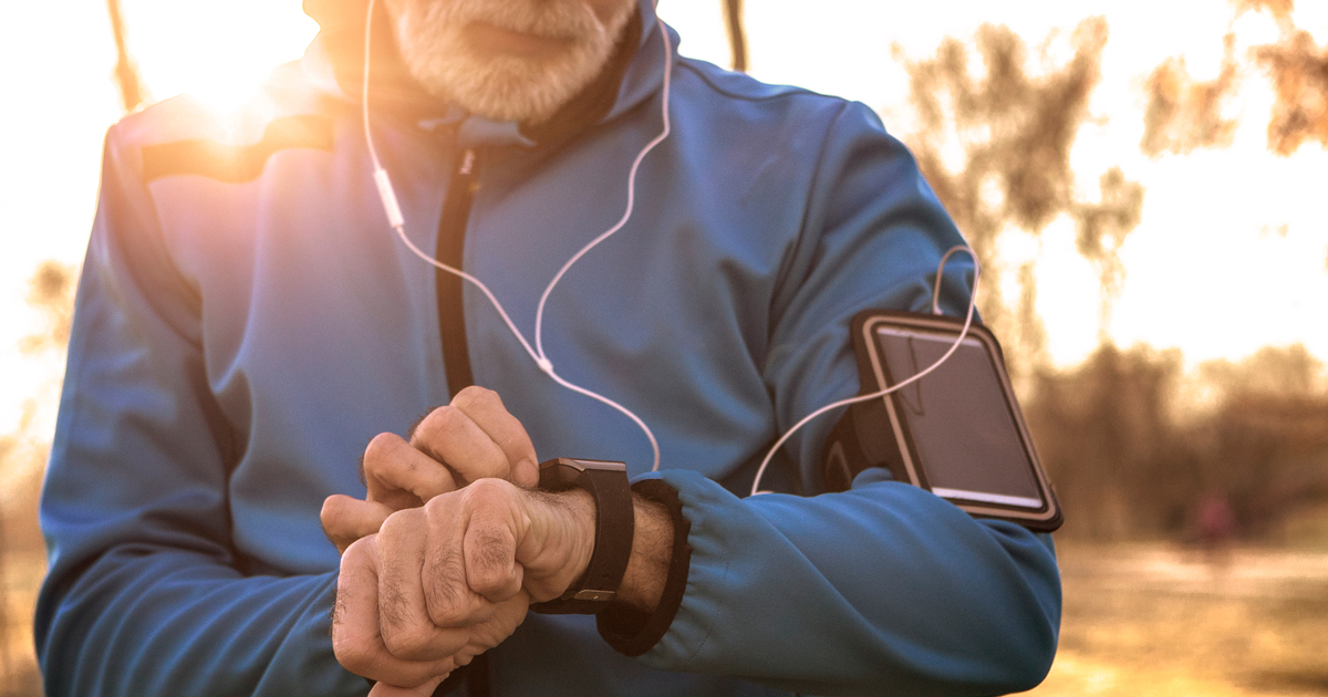 Man looking at his smart watch