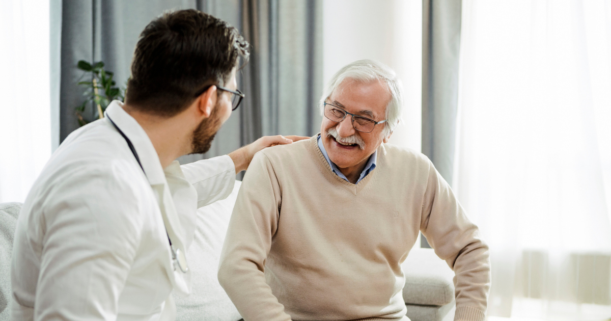 Man talking to his doctor