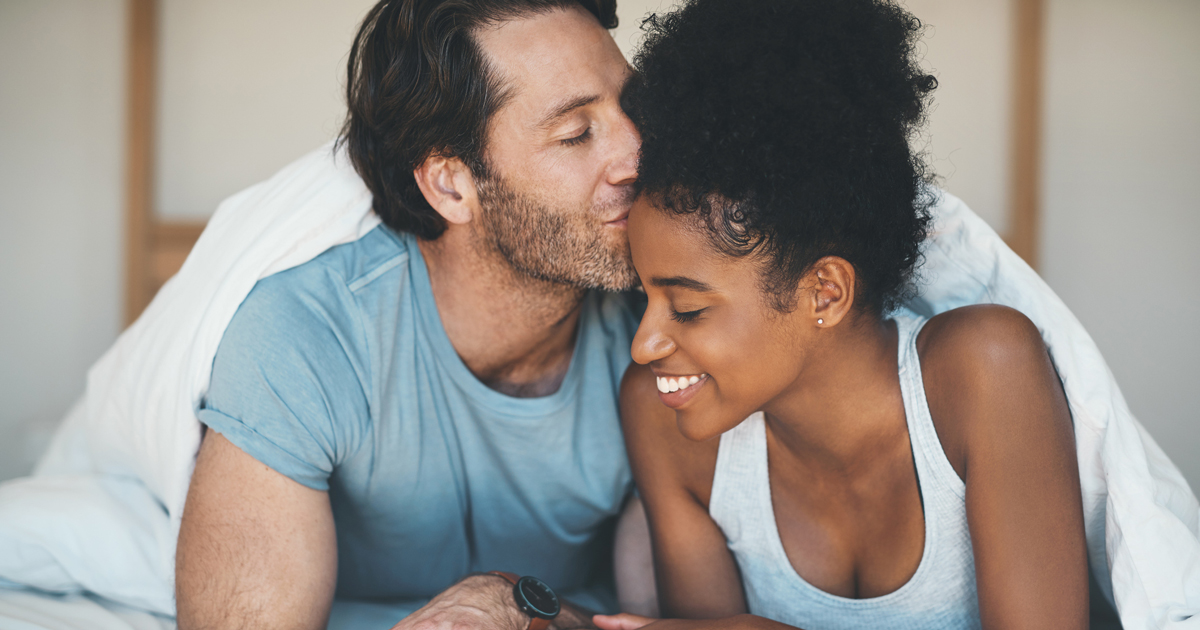 Man and woman in bed