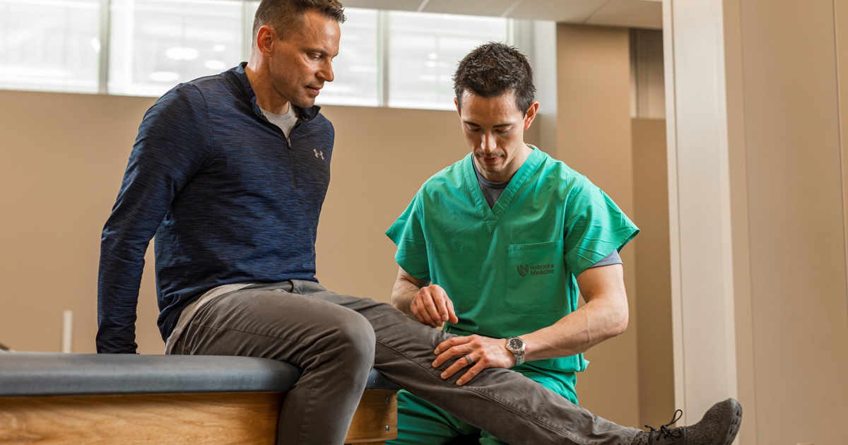 Kray Zeller, patient (left) with Matthew Tao, MD, orthopaedic surgeon