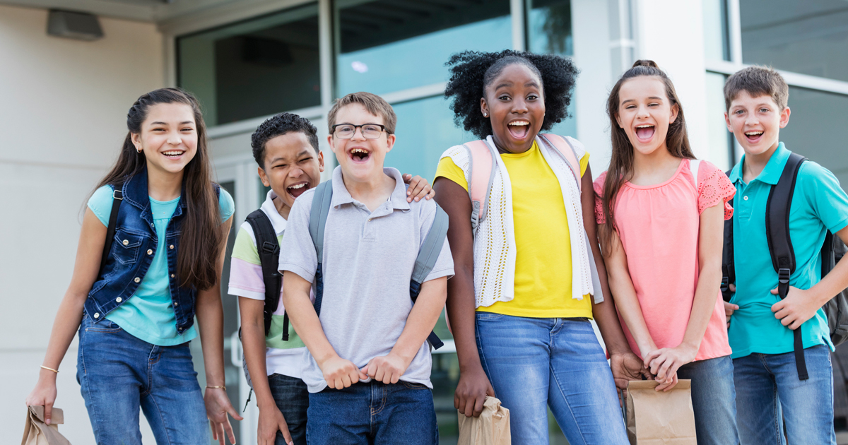 Group of kids wearing backpacks