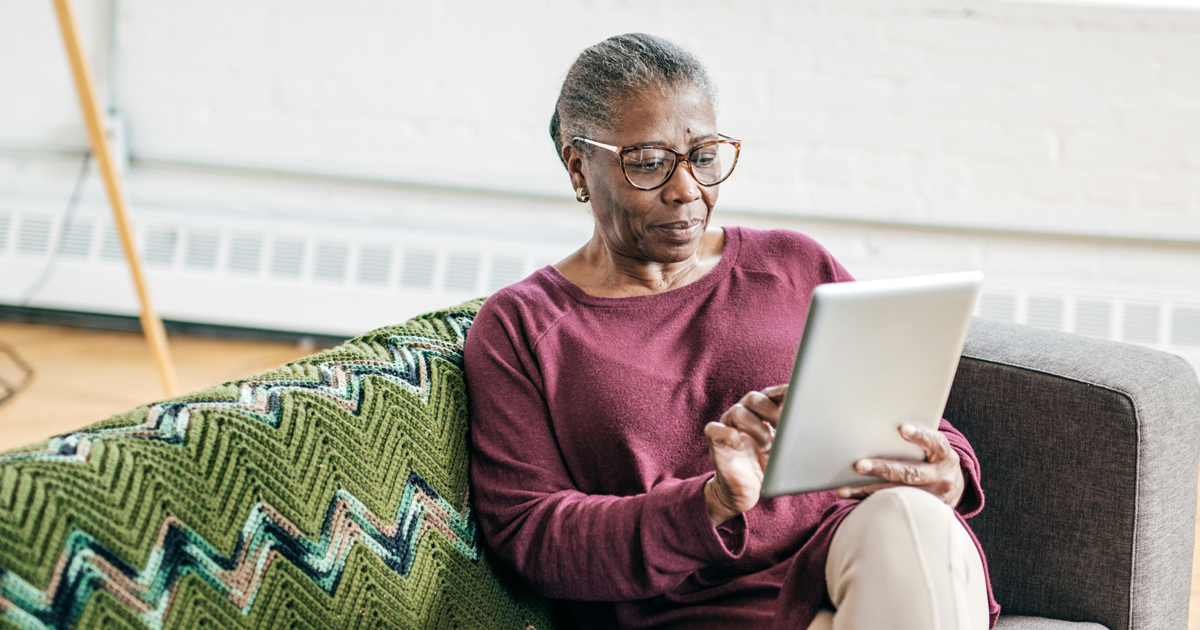 Woman looking at tablet