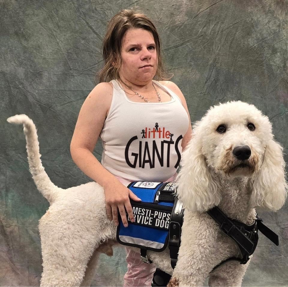 Emily Koesters and her service dog