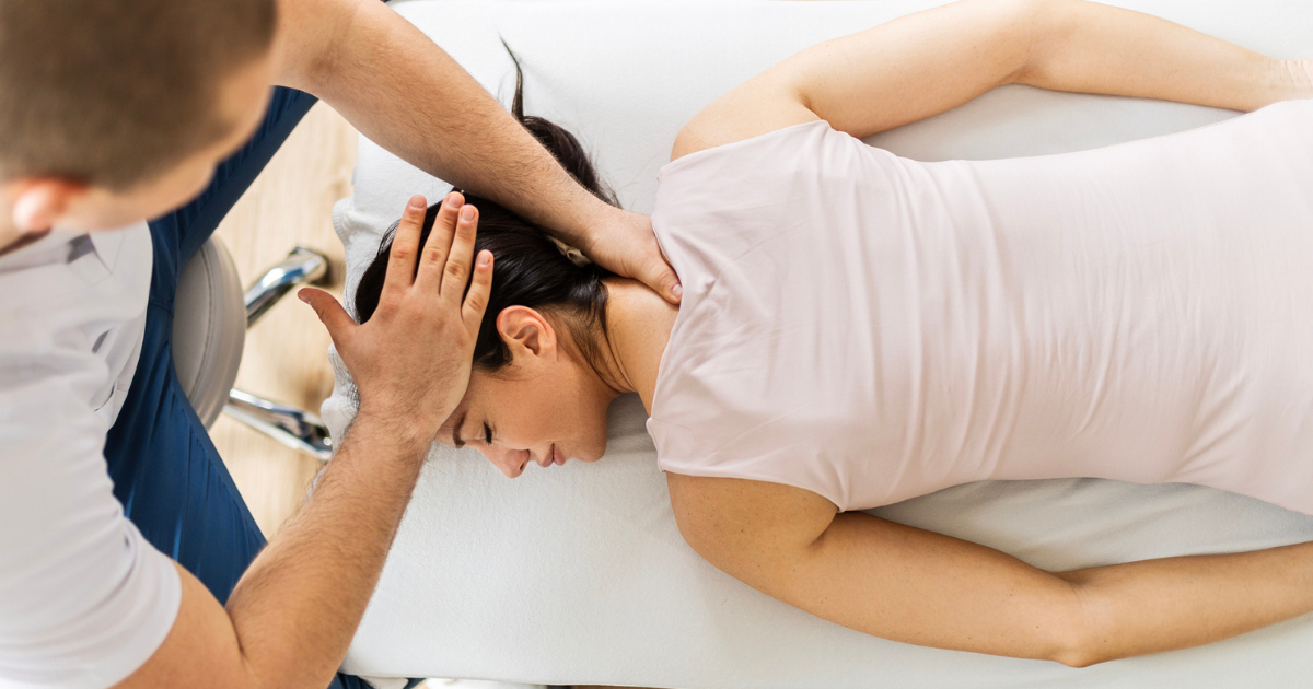 Woman being adjusted by a chiropractor