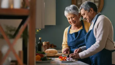 Husband and wife cooking in the kitchen