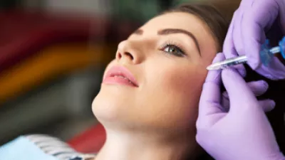 Woman getting cheek filler