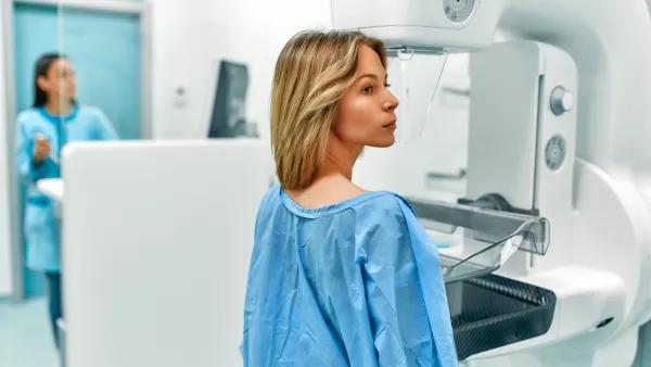 Woman getting mammogram