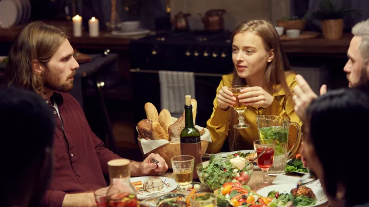 Family talking over dinner