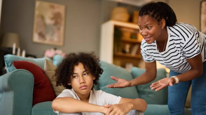 Mom and teenage son arguing