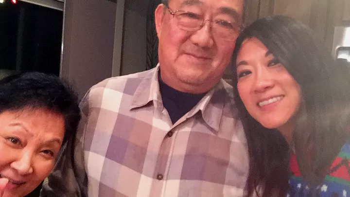 Ming Wang with his wife Lu Wang, left, and daughter Anne Peterson, right. 