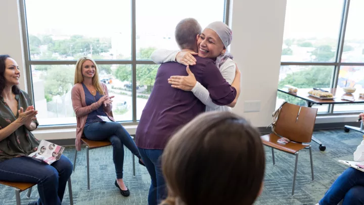 Two women hugging