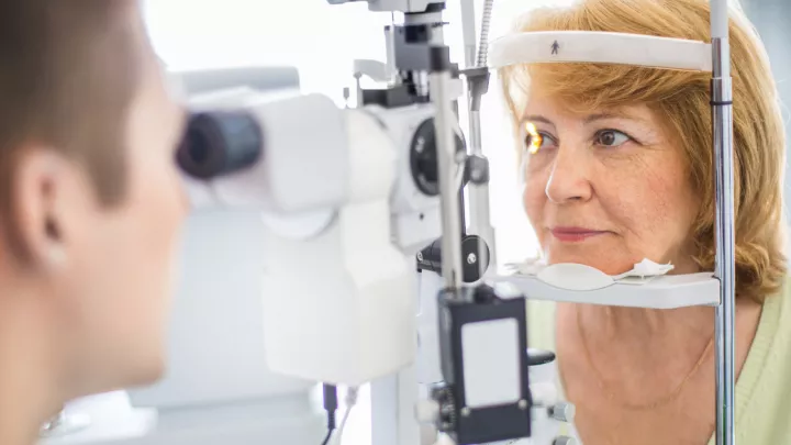 Older woman getting her eyes checked