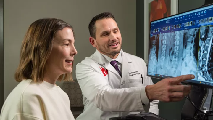Karen Linnell, patient, with Chris A. Cornett, MD, orthopaedic surgeon