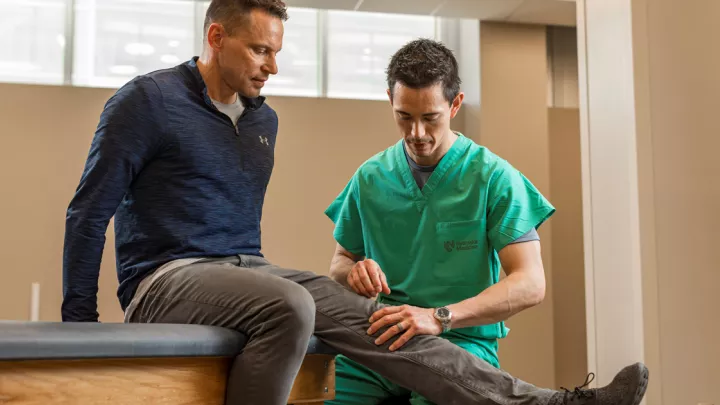 Kray Zeller, patient (left) with Matthew Tao, MD, orthopaedic surgeon