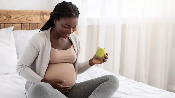 Pregnant woman feels baby move