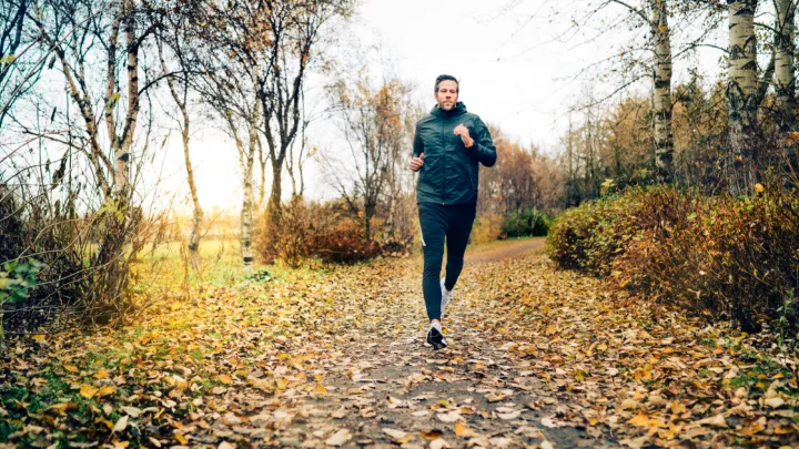 Man running on a trail