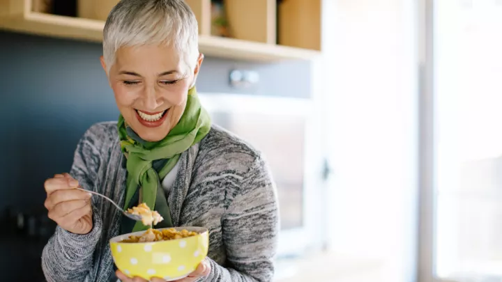 Woman eating cereal
