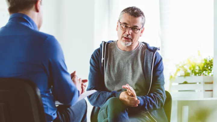 Two people talking