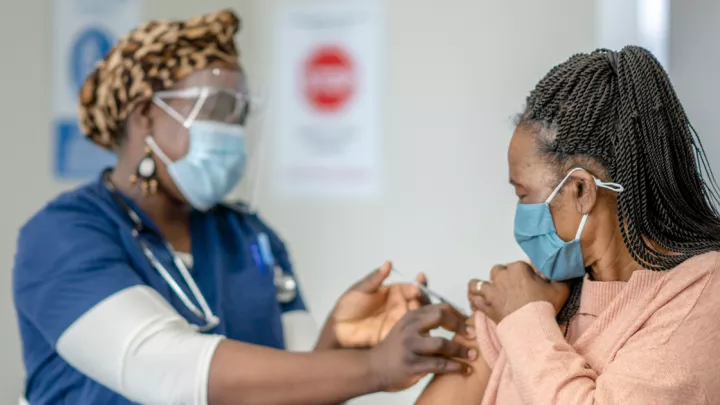 Woman receiving shot