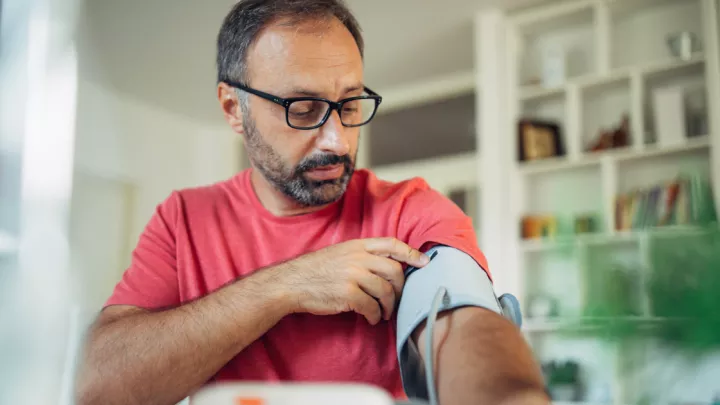 Man checking his blood pressure