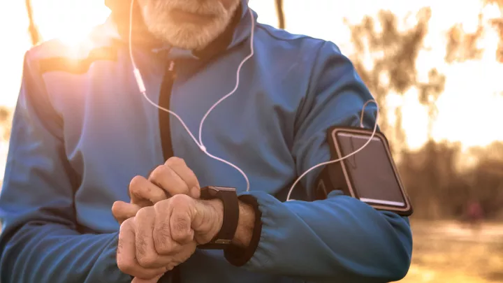 Man looking at his smart watch