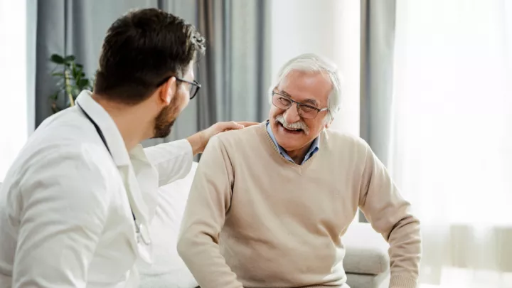 Man talking to his doctor