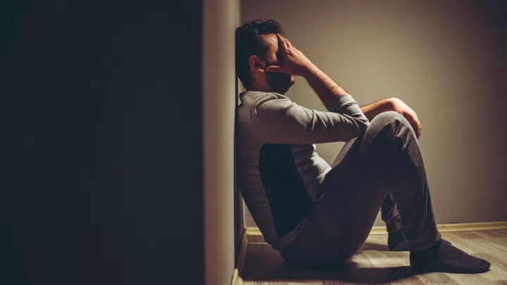 Man sitting on the floor