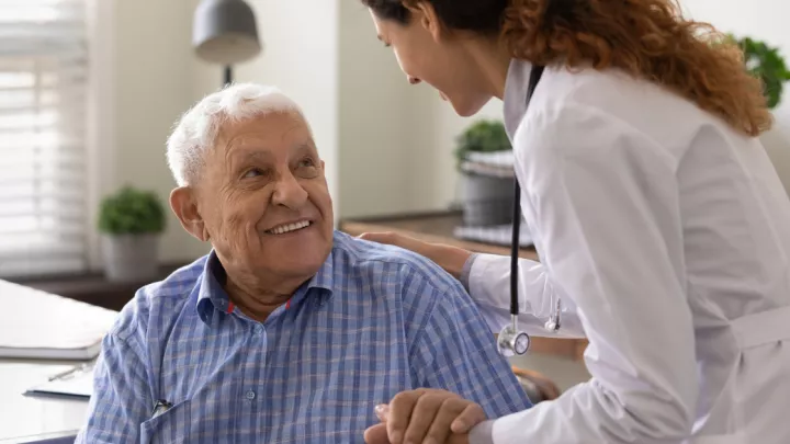 Older man talking to his doctor