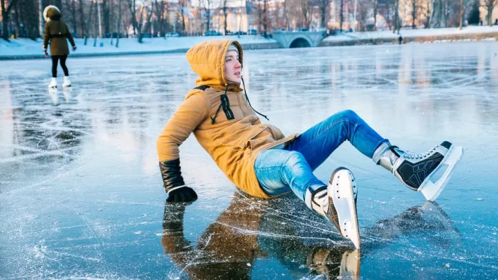 Man fallen while ice skating