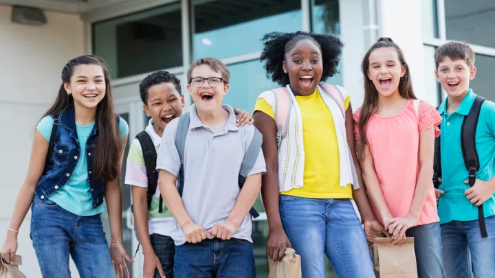 Group of kids wearing backpacks