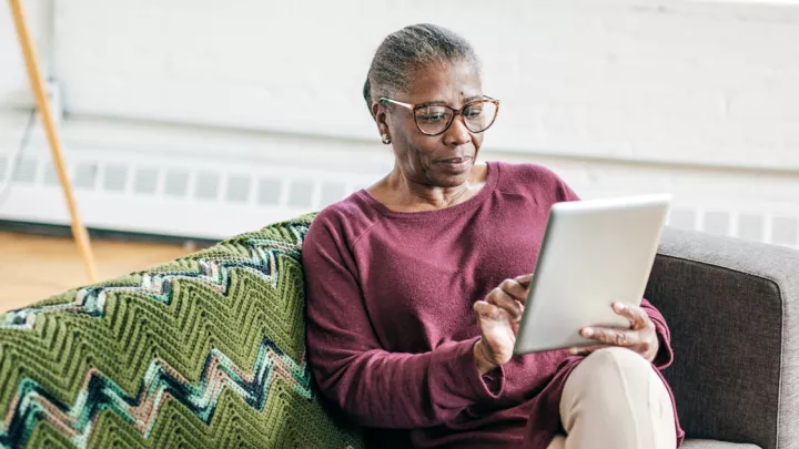 Woman looking at tablet